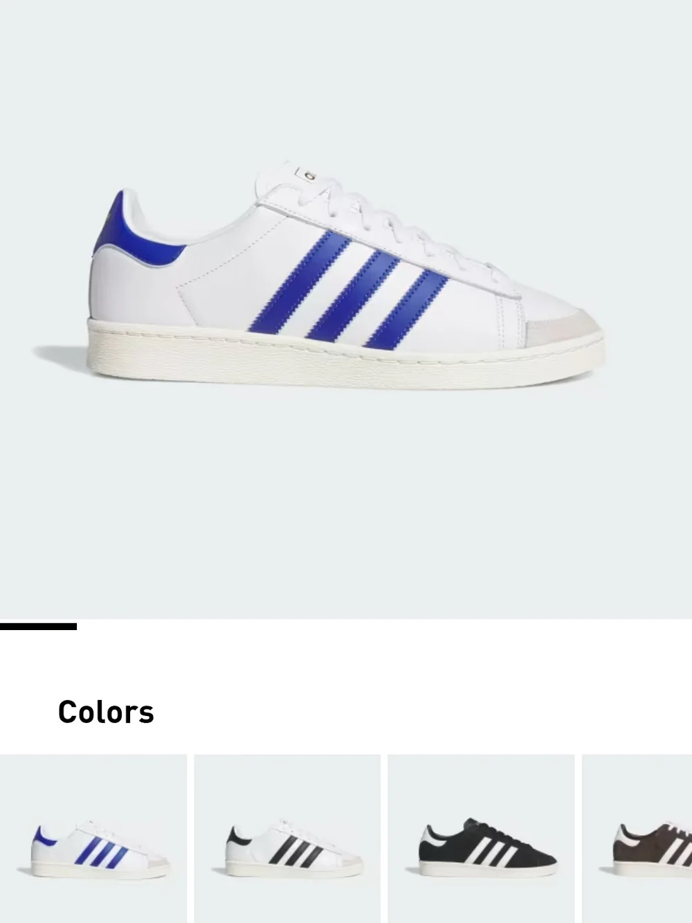adidas White Sneakers with Blue Accents and Black Logo